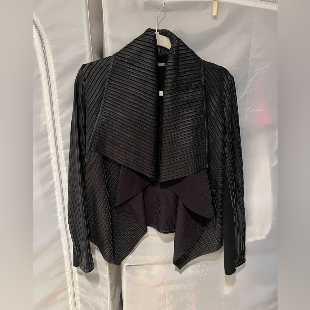 Leather knit sweater.